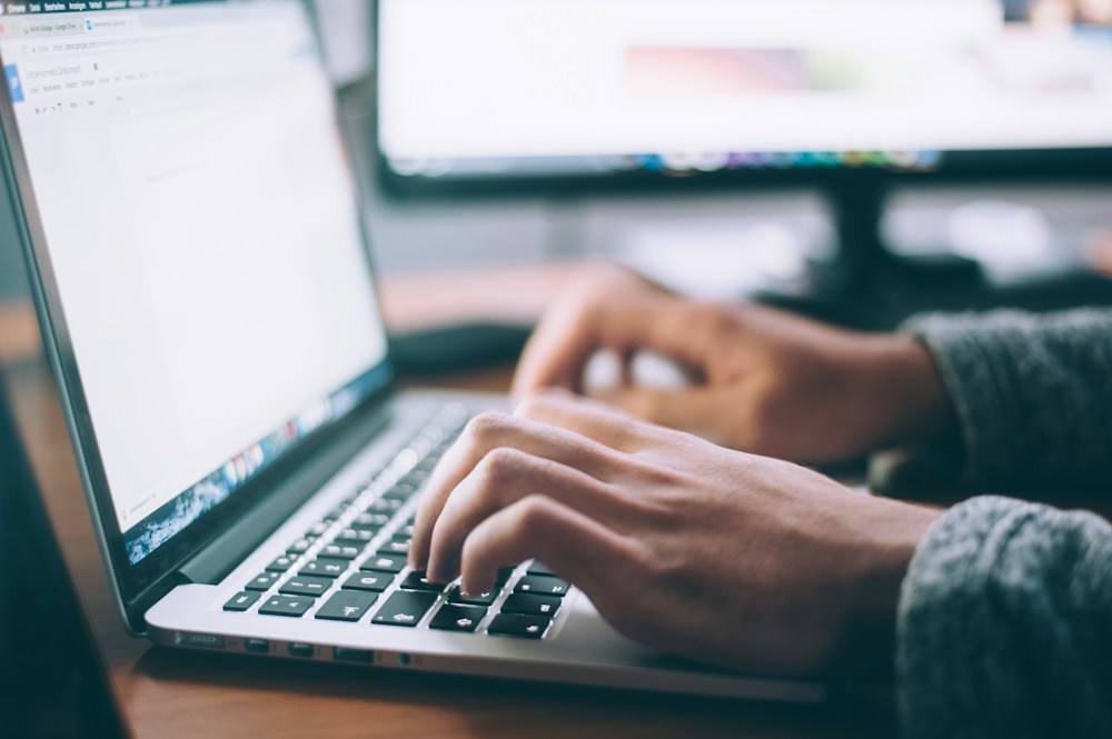 Working on a laptop with a separate digital workspace